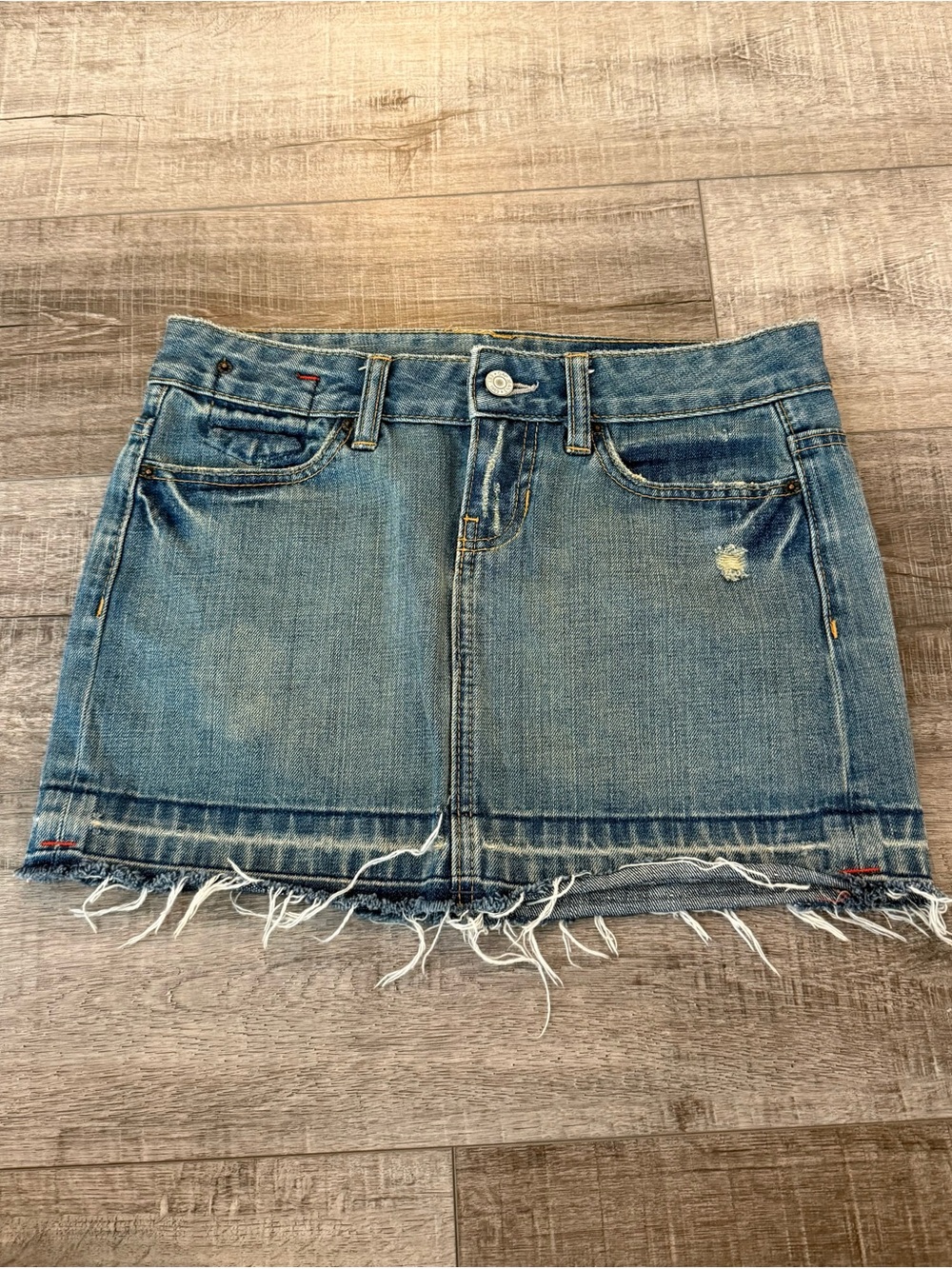 1969 Classic Women’s Blue Denim Mini Skirt – Frayed Hem